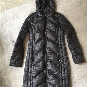 Feathered mid length black winter coat
